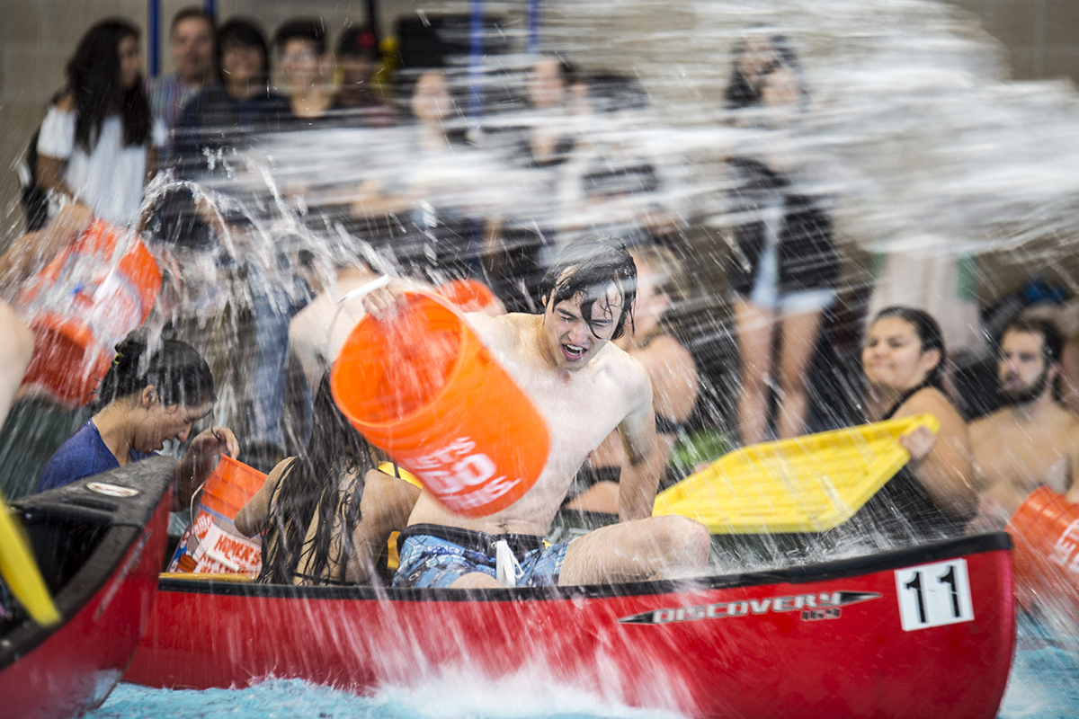 U students kicked off the 2017 fall semester with an intramural sports canoe battleship competition at the Eccles Student Life Center. The goal? Sink your opponent’s canoe before you get sunk. (Photo courtesy of the University of Utah)