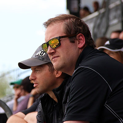 L-R: Phil Kimball and Dax Christensen watch the May 22 minor league baseball game between the Salt Lake Bees and Albuquerque Isotopes.