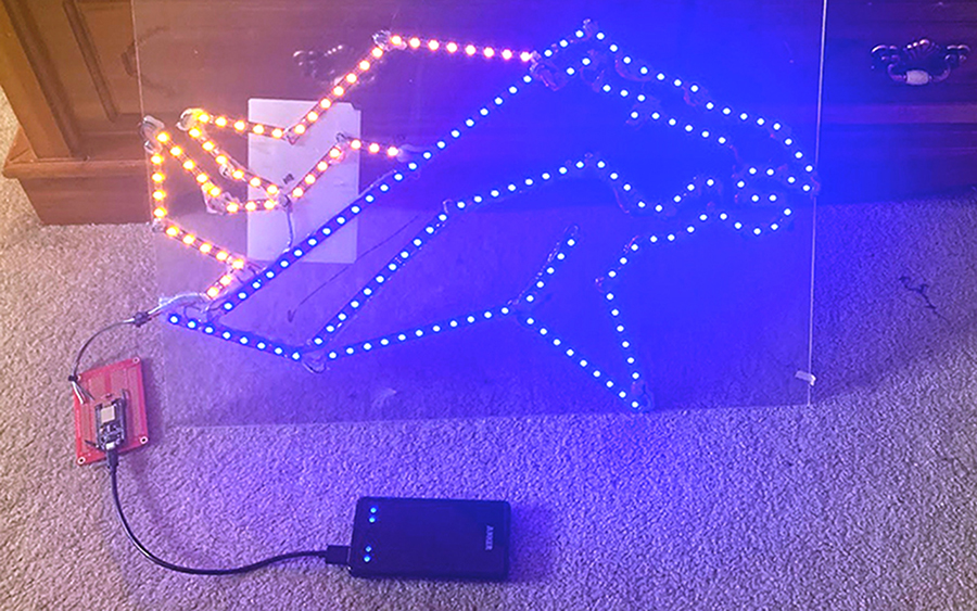 An LED Denver Broncos logo that Harris made for a friend.