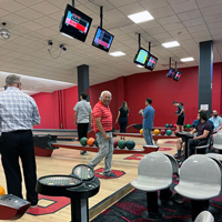 UIT employees bowl September 1, 2022, at the A. Ray Olpin Union bowling alley.