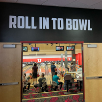 The entrance of the A. Ray Olpin Union bowling alley..