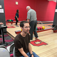 UIT employees bowl September 1, 2022, at the A. Ray Olpin Union bowling alley.