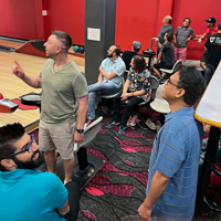 UIT employees bowl September 1, 2022, at the A. Ray Olpin Union bowling alley.