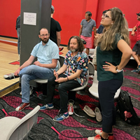 UIT employees bowl September 1, 2022, at the A. Ray Olpin Union bowling alley.