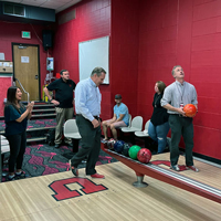 UIT employees bowl September 1, 2022, at the A. Ray Olpin Union bowling alley.