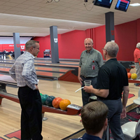 UIT employees bowl September 1, 2022, at the A. Ray Olpin Union bowling alley.