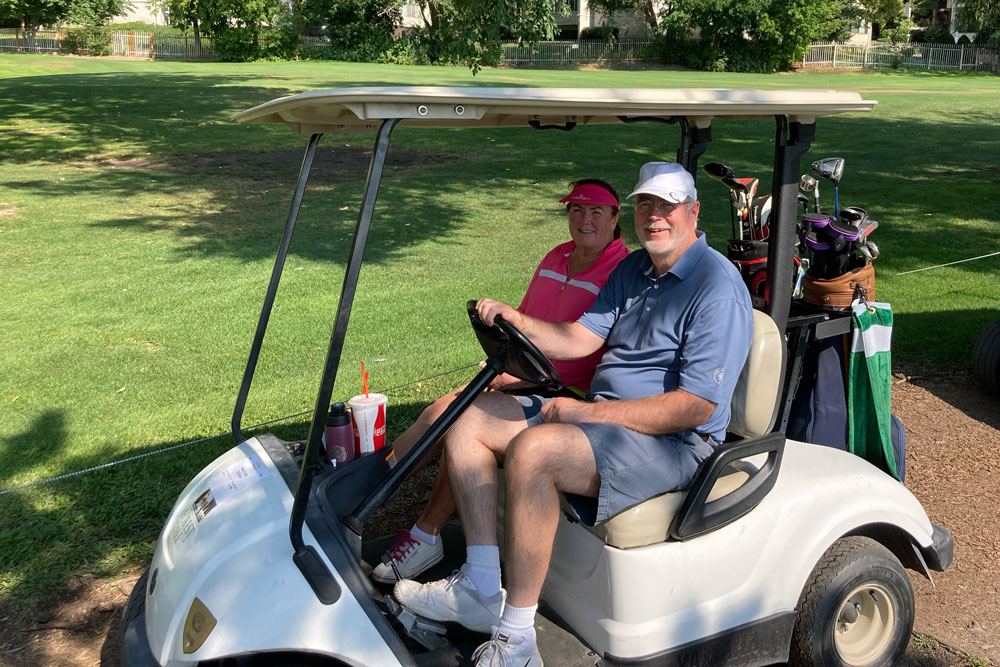 Pat Burton, driving, and Camille Wintch