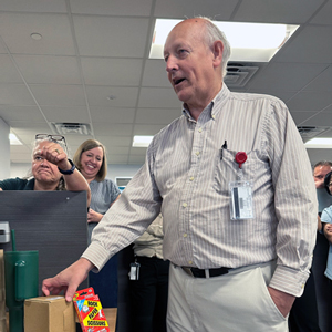 Val Olds selects his prize.