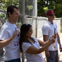 Kim Tanner (SPS), middle, takes a selfie with John Penrose (DCIO), left. Jason Moeller (USS) stands behind them to the right. (Photo by Thanh Nguyen)