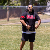 Monty Kaufusi (CTO) throws a double shaka (the hand gesture for "hang loose"). (Photo by Thanh Nguyen)