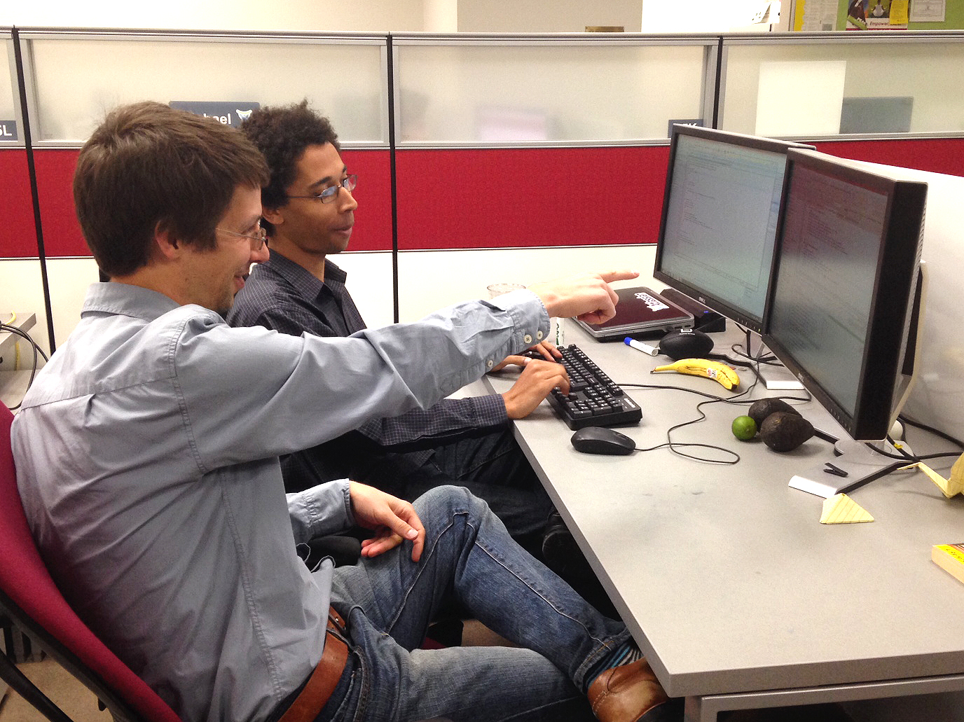 Edgren and Morris-Pearce at desk